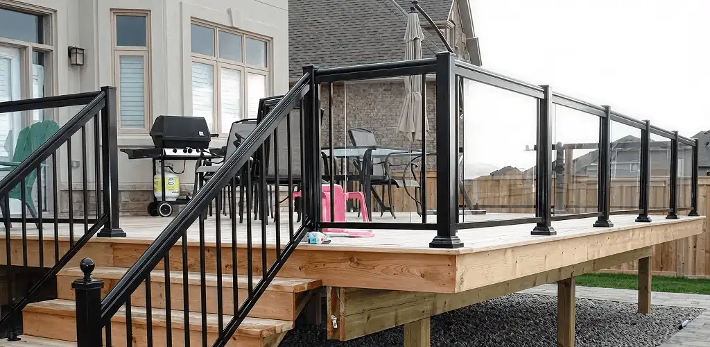 Handrail installation on a deck staircase for safety and code compliance in Syracuse, NY