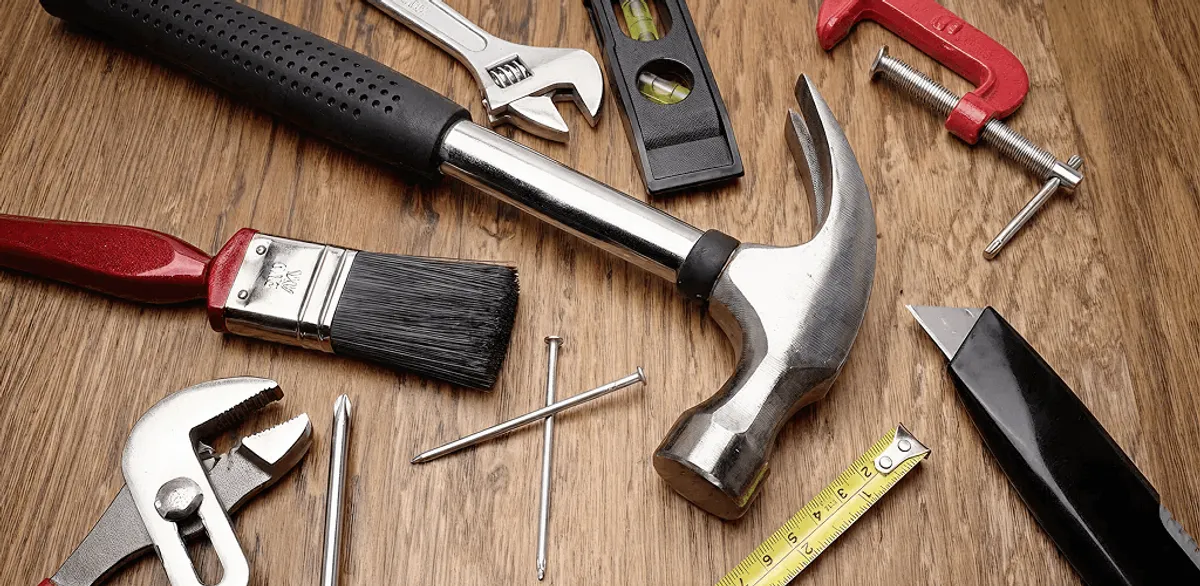 Handyman tools laid out for home repair and maintenance work in Syracuse, NY