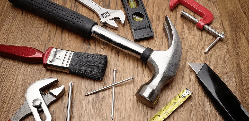 Handyman tools laid out for home repair and maintenance work in Syracuse, NY