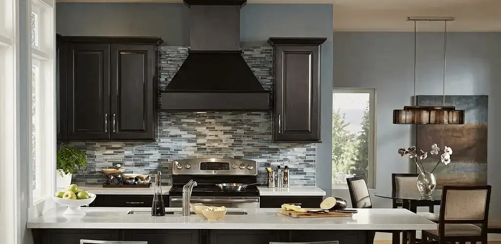 Kitchen cabinet painting and refinishing in a modern kitchen in Syracuse, NY