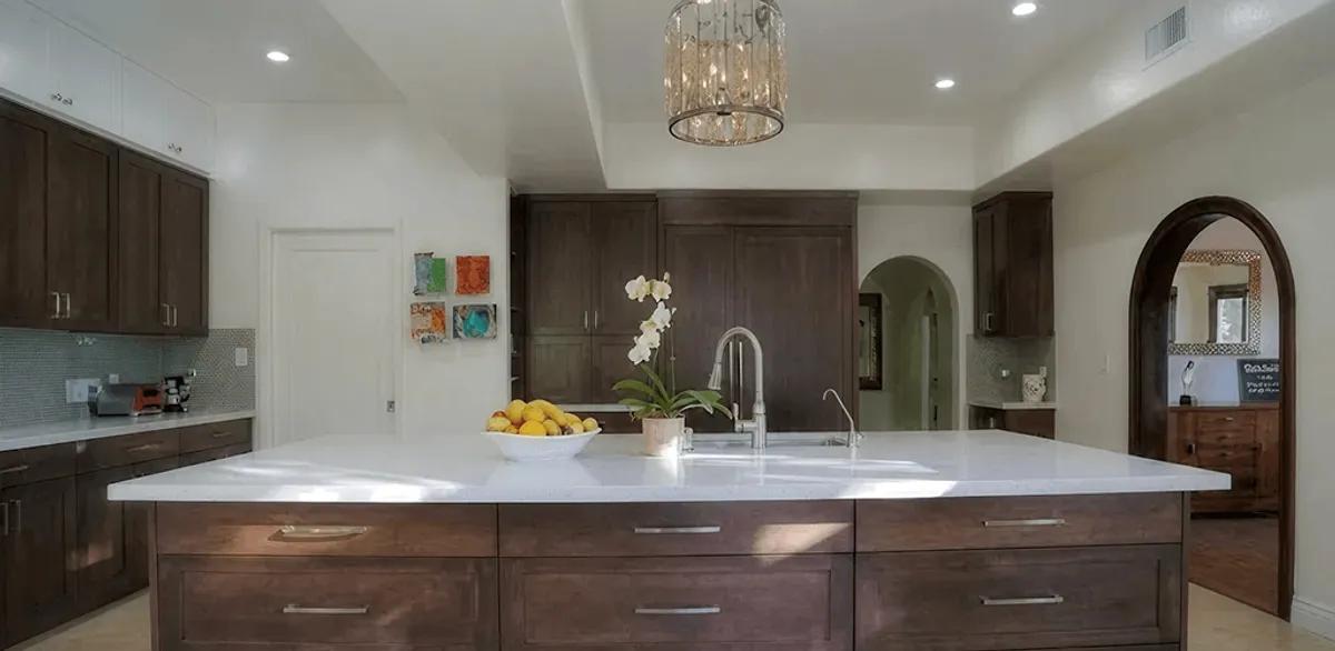 Cabinet refacing project with updated kitchen cabinets and island in Syracuse, NY